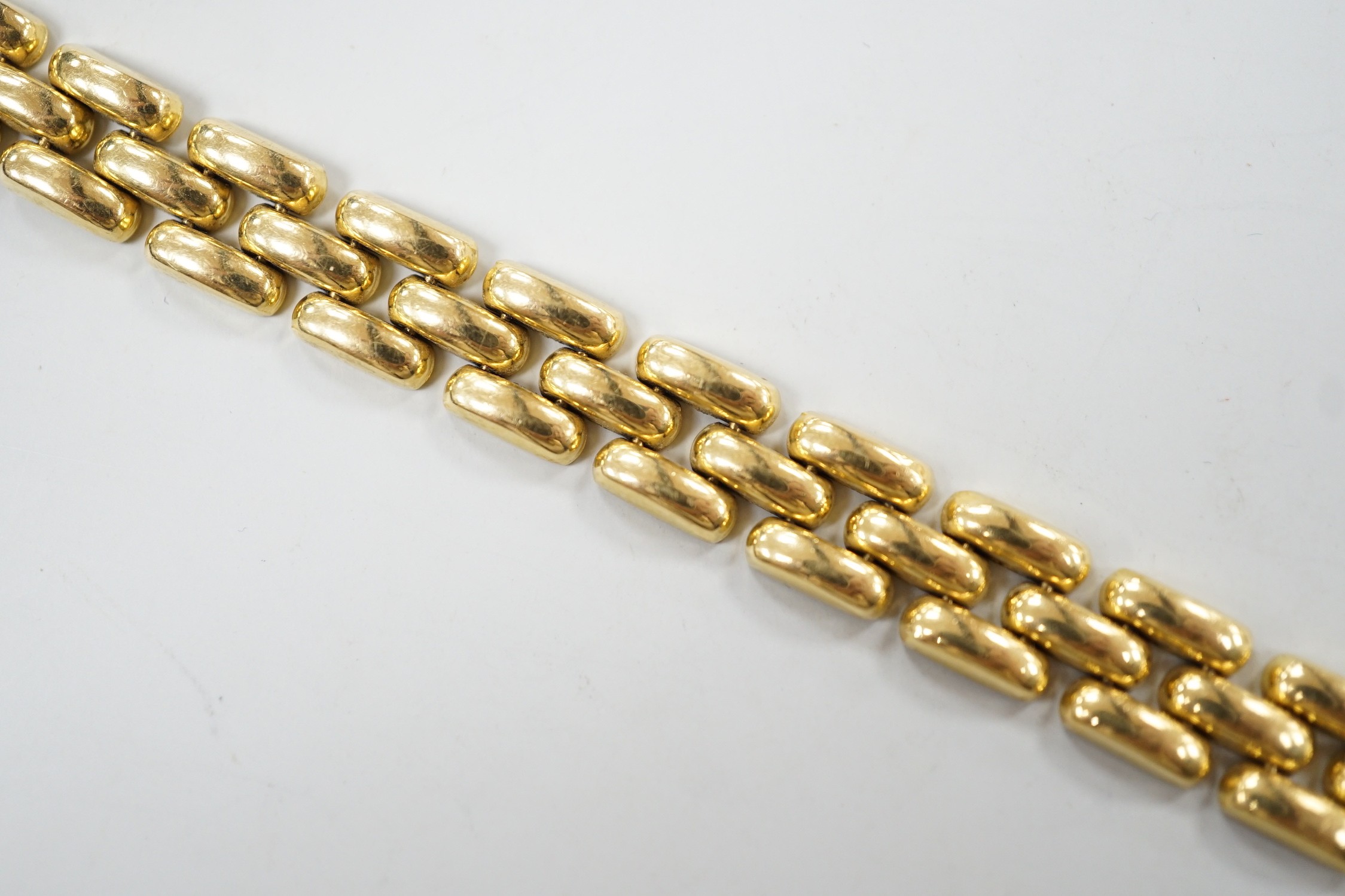 A modern 18ct gold brick link bracelet, 19cm, 21.2 grams.